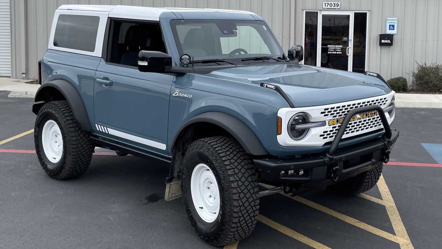bronco wrapped topper
and white grille
