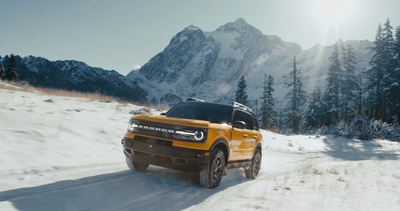 bronco sport badlands yellow body in snow

